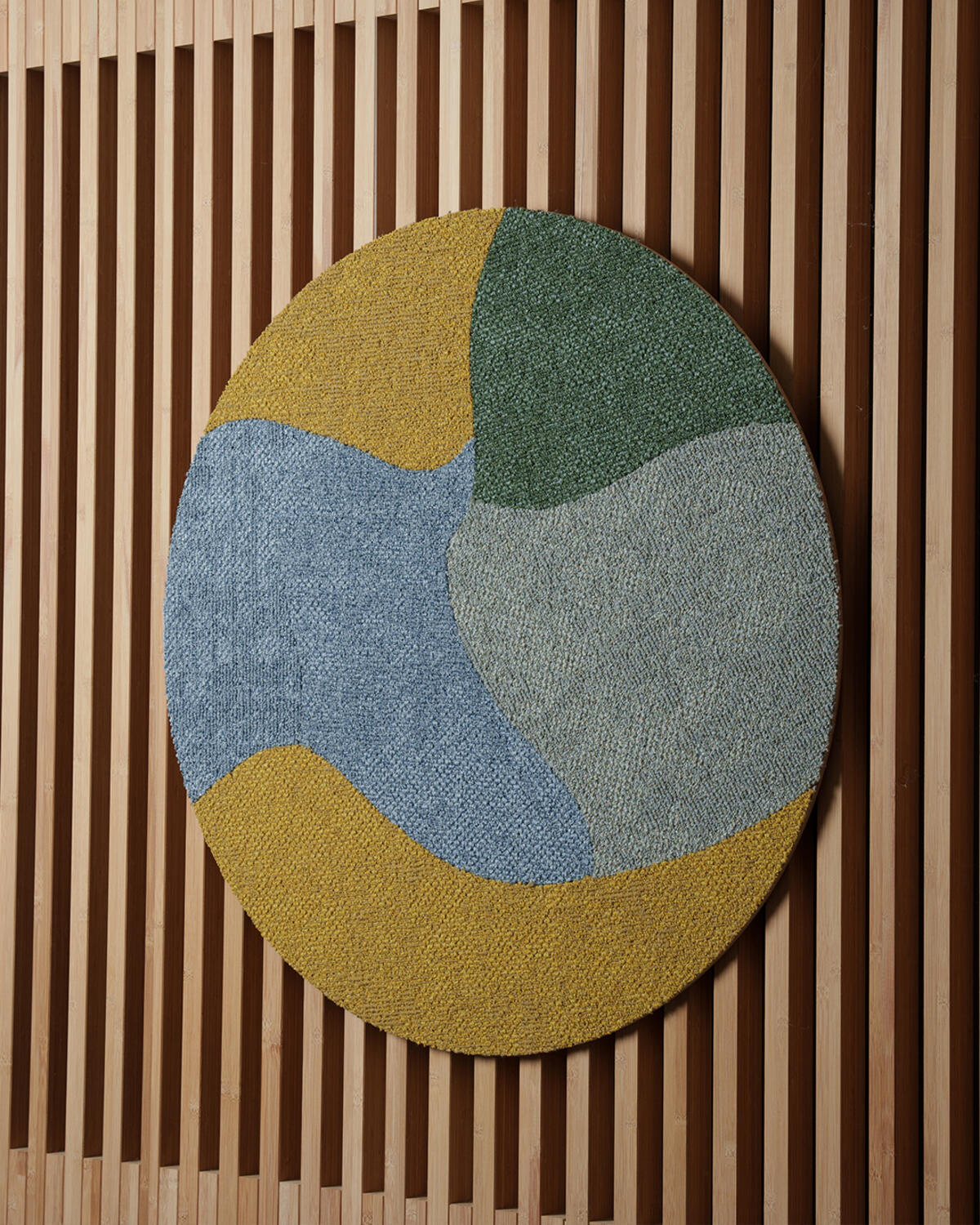 Circular painting made of RECHARGE carpet tiles