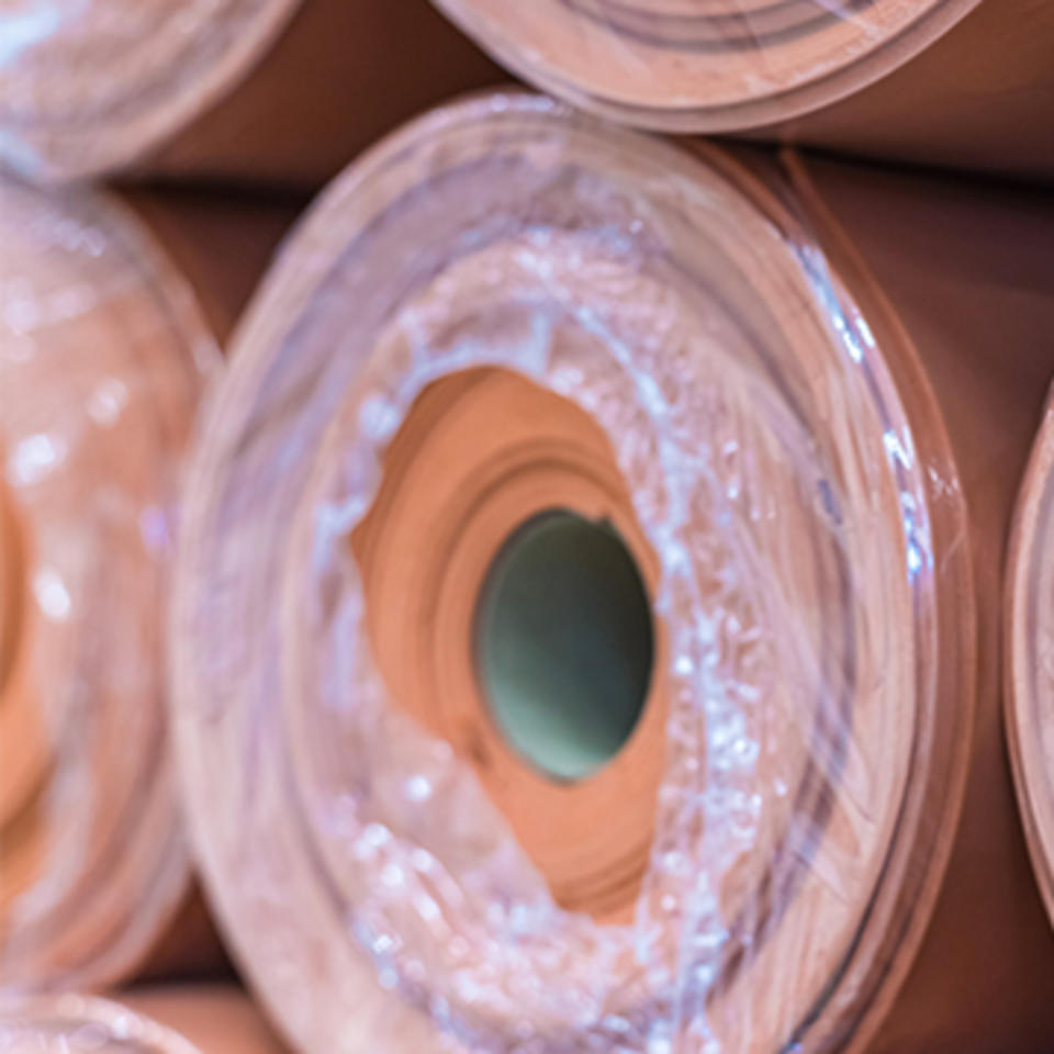 Rolls of flooring stored