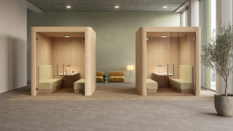 DESSO by Tarkett Arable carpet tiles in a modern commercial space in earthy tones